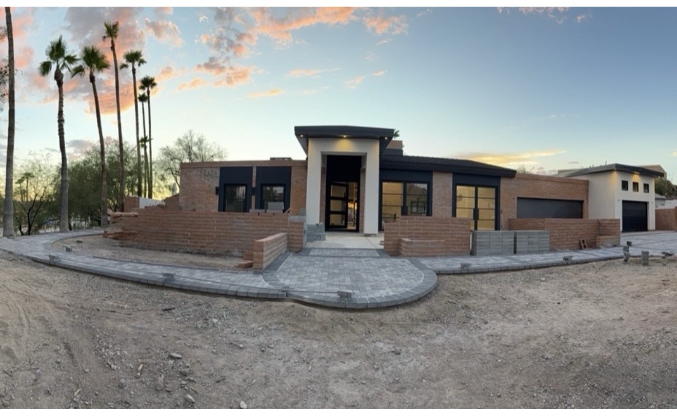Front elevation during construction with custom steel details